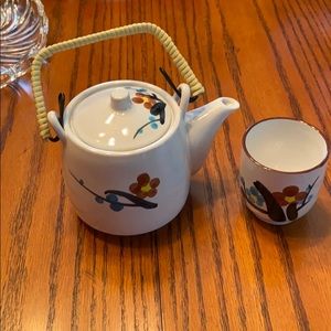 Antique tea pot and cup